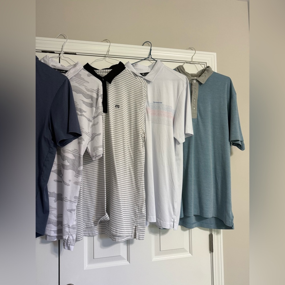 7 Travis Mathew Men's Polo Shirt Collection - Blue, White, Gray